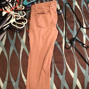 Blush colored skinny jeans